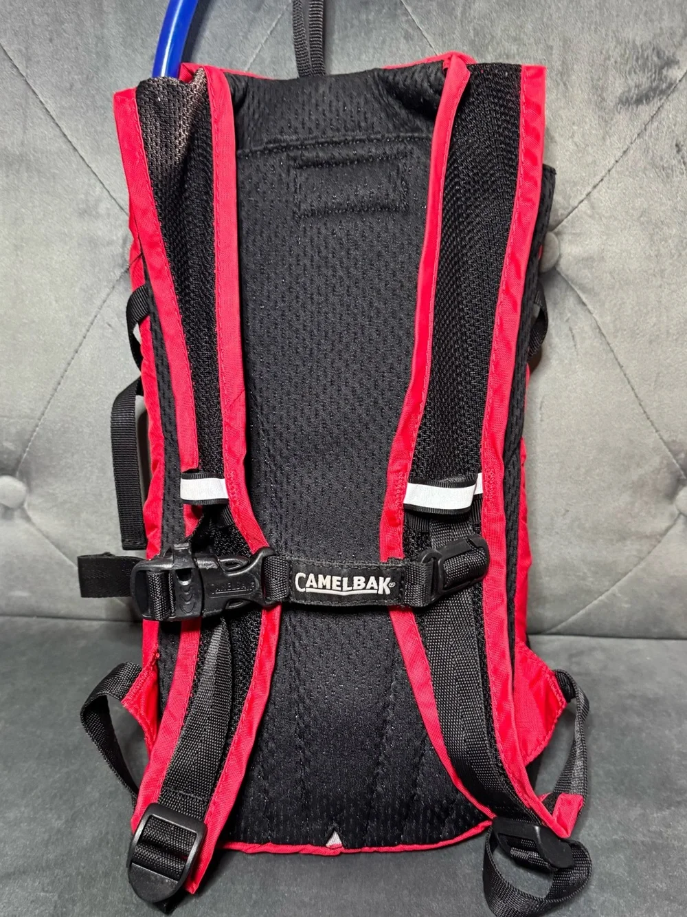 CamelBak Mini M.U.L.E. Kids’ Hydration Red Backpack with Black Flame Graphic